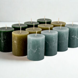 Rustieke kaarsenassortiment in diverse groentinten